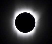 Moon and sun in a total eclipse