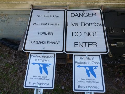 Do not enter / live bomb danger signs