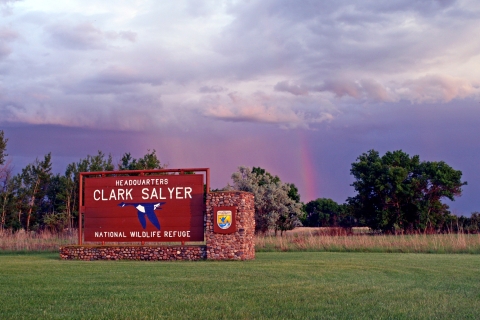 Entrance Sign and Rainbow at J. Clark Salyer National Wildlife Refuge headquarters entrance.