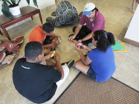 Origami workshop with three students at the Vieques National Wildlife Refuge