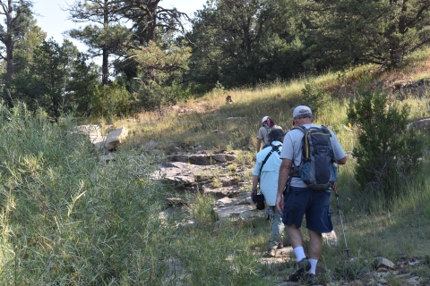 People hiking on the Juniper Trail at Rio Mora National Wildlife Refuge 