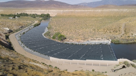 A rendering of the fish passage structure featured on the Truckee River. Design features a ramp structure constructed of rocks and includes steps and pools to allow for gentle migration downstream and resting habitat for fish migrating upstream.
