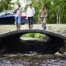 An open-bottom culvert-- a structure under a road-- allows fish passage at Cottonwood Creek in Wasilla, Alaska.