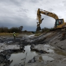 Excavator works on Stillaguamish Tribe's zis-a-ba Coastal Restoration Project