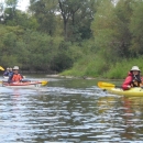 kayakers float down the Mississippi river backwaters along the canoe trail