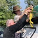 Photo of Leslie Leuckenhoff (right) assisting Bryan Simmons (left) secure a canoe following freshwater mussel surveys by Ashley Riedel/USFWS.