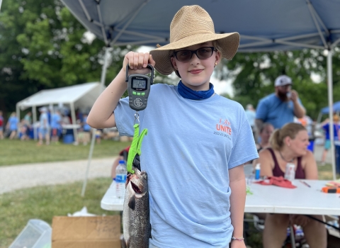 Young angler takes part in Catch a Rainbow Derby at Wolf Creek National Fish Hatchery
