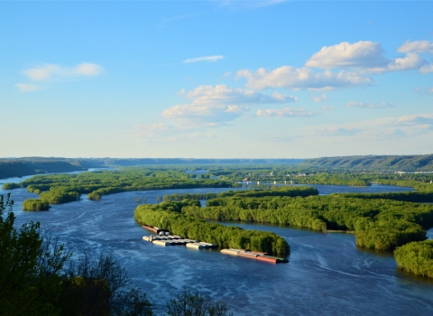 Scenic photo of the river showing islands and boats on the river