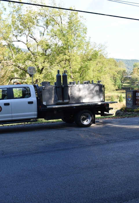 Eastern Band of Cherokee Indians distribution truck parked at the entrance of Erwin National Fish Hatchery