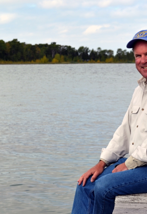 Regional Director Charlie Wooley on a dock at Green Bay National Wildlife Refuge