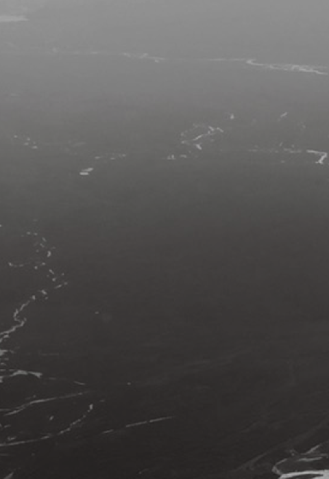 A black and white, aerial photo of a braided river on the Coastal Plain