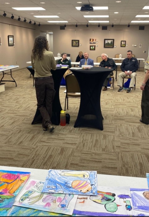 Tables of artwork displayed