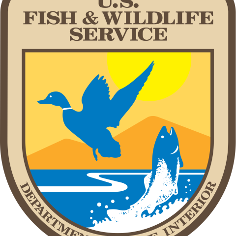 USFWS Logo with blue fish jumping out of water below a blue duck with the text U.S. Fish & Wildlife Service, Department of the Interior