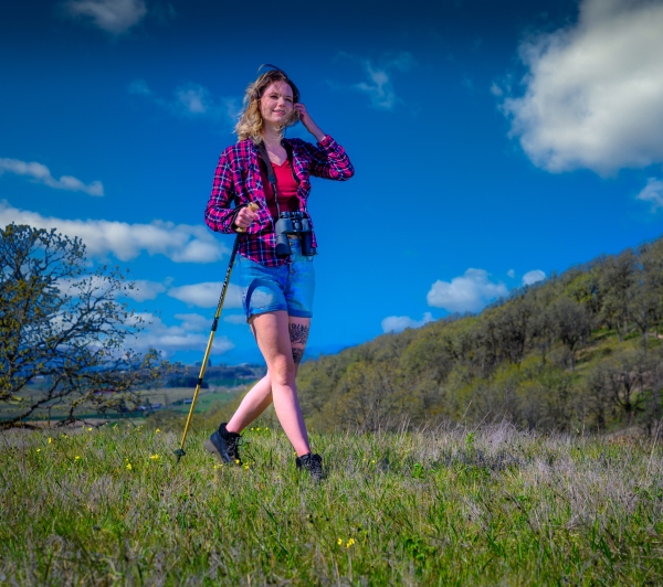 Person walking a trail on a clear day