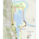 Image depicts a map of the Kootenai National Wildlife Refuge. A red zig-zag line covers all of the auto tour route and the upper portion of the Deep Creek Trail, indicating its closure. A bold yellow line indicates that the Chickadee Trail, Myrtle Falls Trail, Ole Humpback Trail, Lions Den Road, and Riverside Road all remain open.