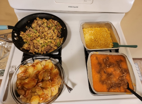 Thanksgiving food on a stove