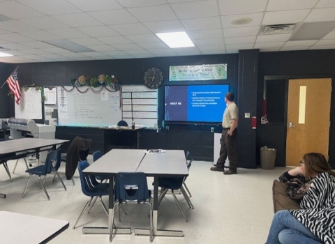 Fish Biologist Creed Chapman gives a presentation to a local highschool.