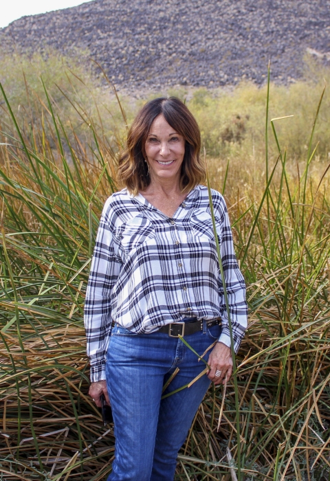 a woman standing outside 