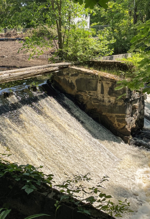 The High Street Dam intact with water passing over