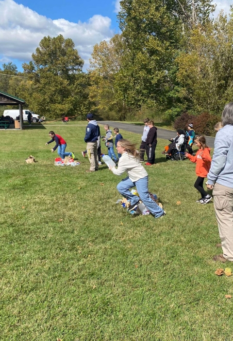 Kids running in grass 