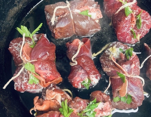 Pre-cooked elk braciole wrapped in twine