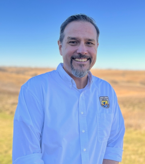 A portrait of Will Meeks on the prairie in Iowa