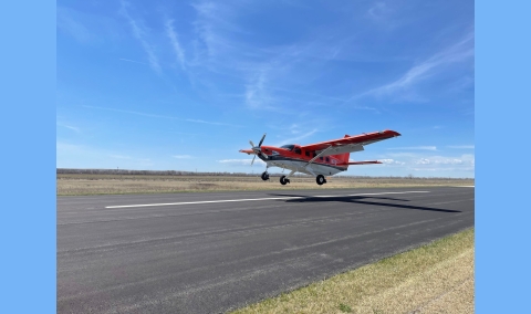 airplane coming in to land on a runway