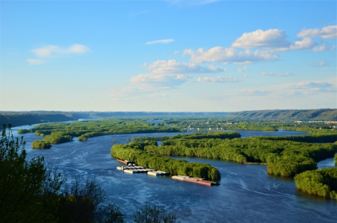Scenic photo of the river showing islands and boats on the river