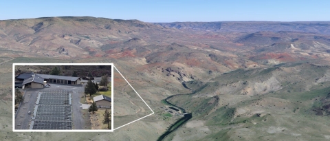 A landscape image of a valley with an arrow pointing to the location of a hatchery deep in the valley. There is a zoomed in photo in the photo showing a close up of the hatchery.