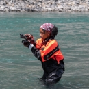 USFWS digital media intern, Typhanie Shepherd, capturing video footage of fiel