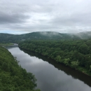 A view of a rolling hills and a river