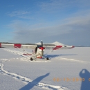 Plane landed on skis in snow 