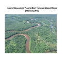 The front cover of the Seney National Wildlife Refuge Habitat Management Plan - a forest with a river flowing through.