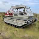 Coastal Program biologist operating a Marsh Master at the Little Creek Wildlife Area near Port Mahon Delaware