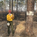 Erin Sasser holding a RCW box