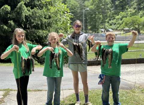 Showing off their catch for the day.