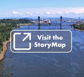 View of Willamette River with railroad bridge in the background.