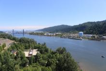 View of Willamette River with railroad bridge in the background