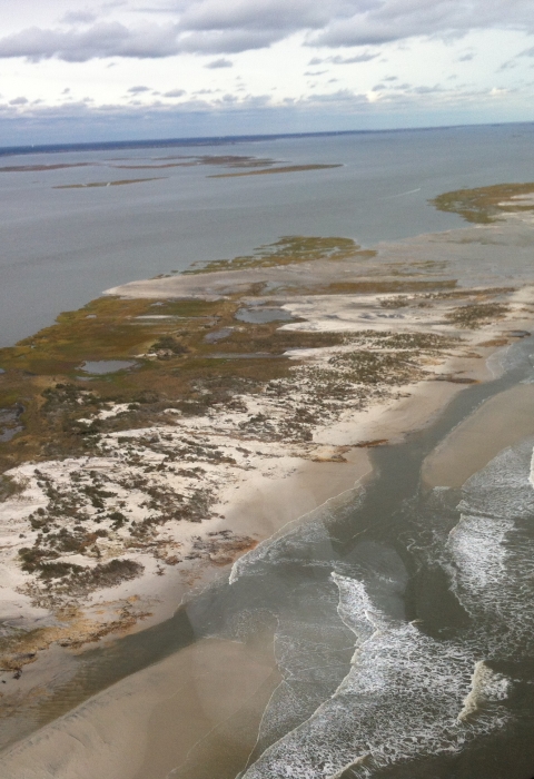 barrier island covered with water and sand 