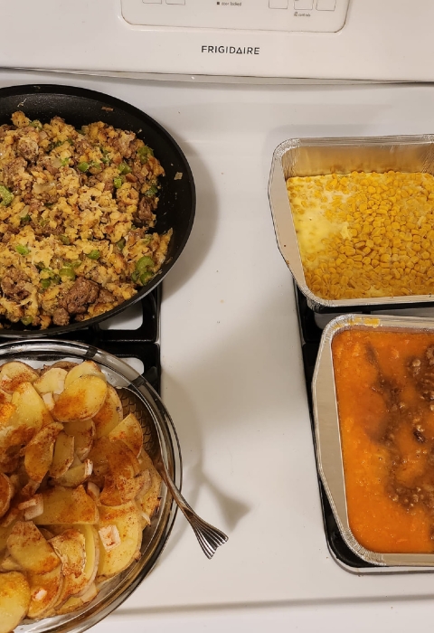 Thanksgiving food on a stove
