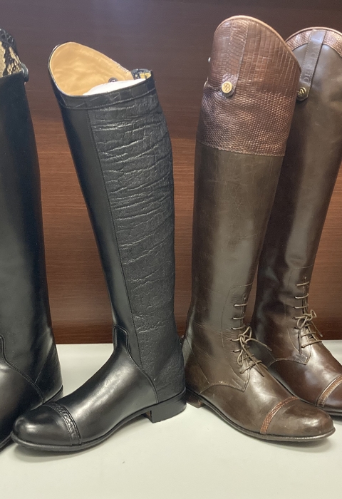 Display of boots that made from and trimmed with protected species such as elephant, python, and crocodile..