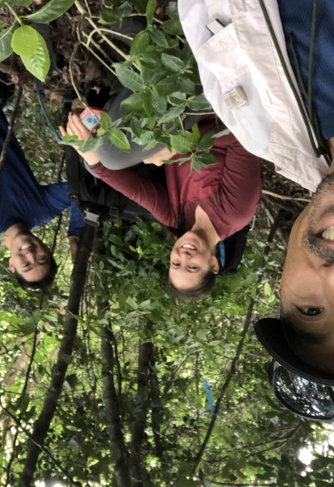 James Kwon in the forest with two other people