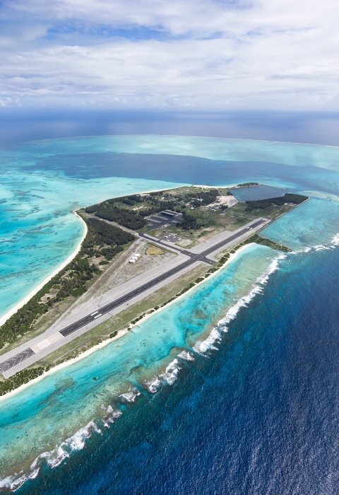 Midway Atoll National Wildlife Refuge aerial view showing Sand Island and Eastern Island.