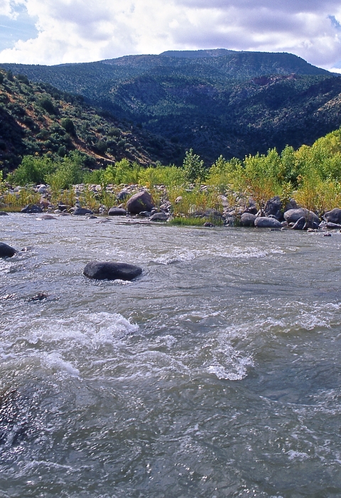 A river with mountains behind it