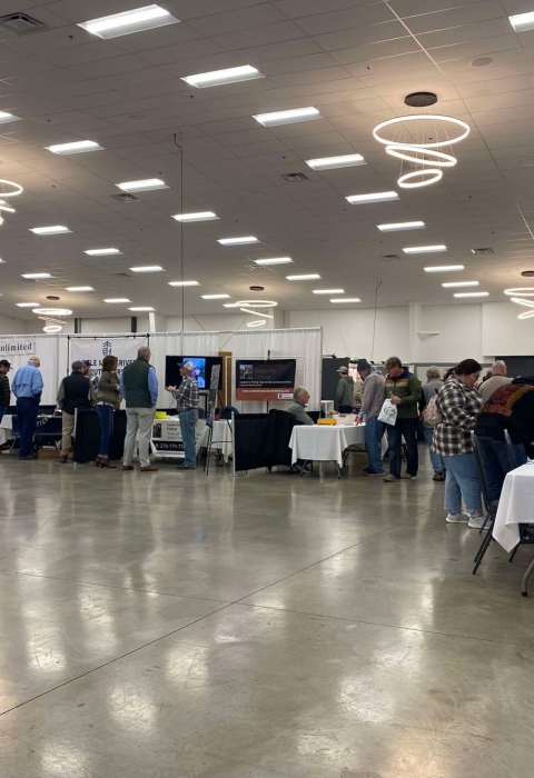 Exhibitors set up in conference room