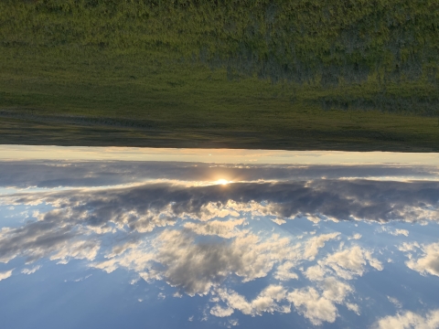 Sun falling over the Lostwood National Wildlife Refuge prairie