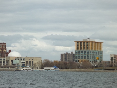 a waterfront view of several buildings and boats