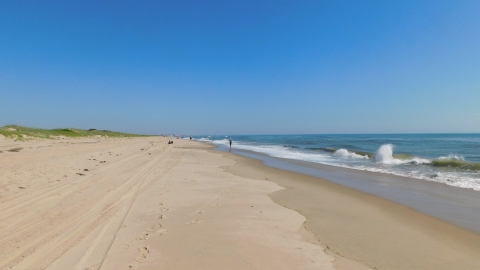 Back Bay NWR beach with fishermen