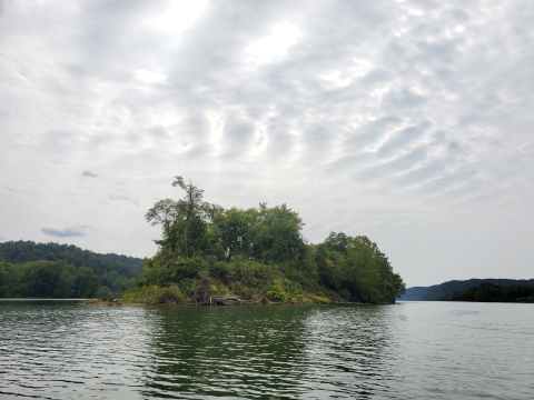 Grandview Island with dramatic clouds overhead