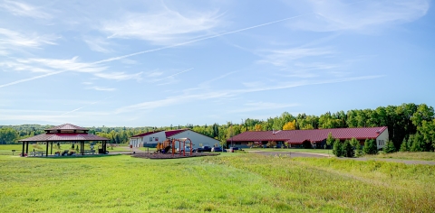The Iron River National Fish Hatchery campus with picnic pavilion, playground, fish hatchery and visitor center